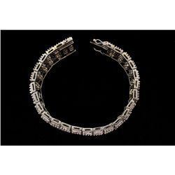 BRACELET:  [1] 18KWG bracelet set with rd and baguette diamonds, approx. 8.75cttw, J, fair-poor / SI