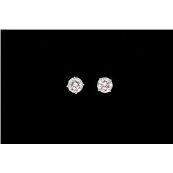 EARRINGS:  [1 pair] 14KWG earrings set with rbc dia.s, 6.70 x 4.10mms = 1.15 cts, 6.75 x 4.20mms = 1