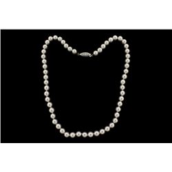 PEARLS:  [1] Single strand of 7.0 - 7.5mm fine quality Akoya pearls with an 18KWG fishhook clasp set