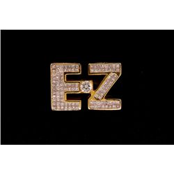 RING: Lady's 14kw (yellow plated) initial  EZ  invisible set diamond ring; 1 (ctr) rb dia, 5.0mm = e