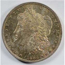 1884-O MORGAN DOLLAR MS60 TONED