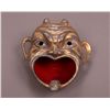 Image 1 : Antique Howling Devil Ashtray.  The cigarette/cigar smoke rises from within the nostrils when placed
