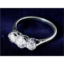 A FINE WHITE GOLD THREE STONE DIAMOND RING: Est.800-1200...