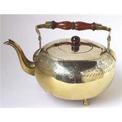 A BRASS FIRE ORNAMENT: a stag, 8.5" high, a First World War brass mug  with strap handle, 2.5" hi...