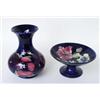 Image 1 : A BLUE MOORCROFT TAZZA: raised a circular foot, the interior  decorated Hibiscus pattern, two flo...