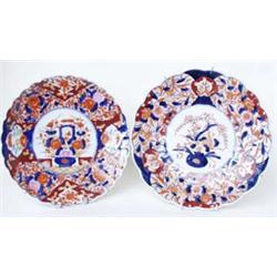 A LATE 19TH CENTURY IMARI CHARGER: with scalloped rim, the central  panel a planter of exotic tre...