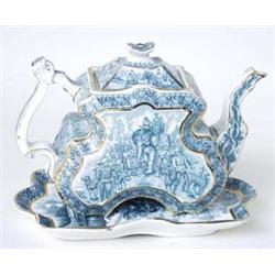 AN UNUSUALLY SHAPED VICTORIAN TEA POT: with matching stand, flat  sided, transfer printed in gree...