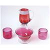 Image 1 : A VICTORIAN CRANBERRY GLASS CREAM JUG: with clear glass handle and  crimped clear glass feet, the...