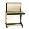 Image 1 : AN EDWARDIAN EBONISED WRITING TABLE: the top with moulded edge and  inset a tooled green skiver,...