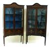 Image 1 : A PAIR OF EDWARDIAN MAHOGANY DISPLAY CABINETS: with arched moulded  pediment over a simulated inl...