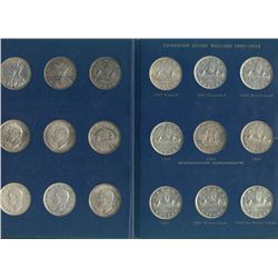 1935 to 1965 $1 Set in Old Blue Whitman Holder.  Date set of 35 coins EF to UNC.  Includes 1945, 194
