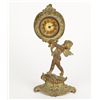 Image 1 : Antique Brass Cherub Holding a Clock