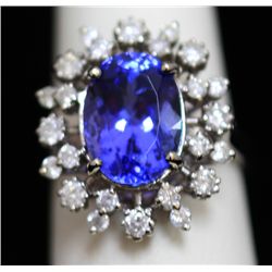 14K GOLD OVAL TANZANITE AND DIAMOND RING