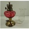 Image 2 : VINTAGE MINIATURE OIL LAMP, CLEAR GLASS WITH A RED OVER GLAZE, MAKE IN HONG KONG