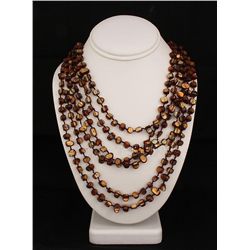 680CTW GOLDEN BROWN 6ROW MOTHER OF PEARL NECKLACE