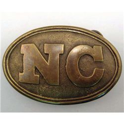 5604 - BRASS BUCKLE MARKED NC