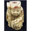 Image 1 : 5574 -  JAPANESE BONE NETSUKE HAPPY MAN HOLDING BAG