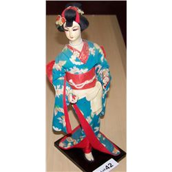 VINTAGE JAPANESE DOLL ON BASE