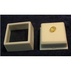 318. Rutilated Quartz faceted Gem 1.55 carat. 9x7mm.