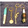 Image 1 : 329. Malaysia 10 Sen Coin Key ring; Sharpie Key ring; Sparkplug Key ring; & a Six-shooter Key ring.