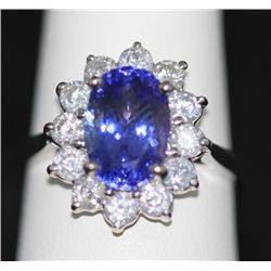 14K GOLD OVAL TANZANITE AND DIAMOND RING