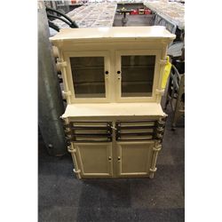 CREAM COLORED PAINTED METAL MEDICAL CABINET WITH 2 GLASS CUPBOARD DOORS