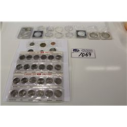 A COLLECTION OF ROYAL CANADIAN MINT COINS INCLUDING:1949 SILVER $1 MS62, 11 CANADIAN $1 COINS, A