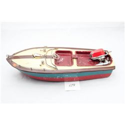 Vintage tin toy motorboat