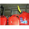 Image 1 : 4 red jerry cans
