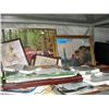 Shelf lot of framed and unframed pictures