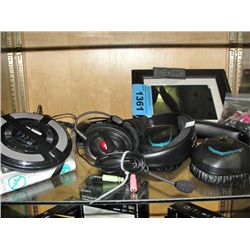 Shelf lot of assorted electronics, digital photo