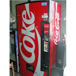 Coin operated coca cola pop machine