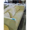 Image 1 : Off white microfiber suede sofa with 4 cushions