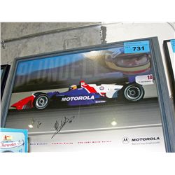 Framed formula1 racing photo, signed by driver