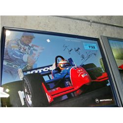 Framed formula1 racing photo, signed by driver