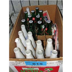 Box of vintage 7up and pepsi cola bottles