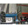 Image 1 : Shelf lot of misc fans, portable stereo, clock