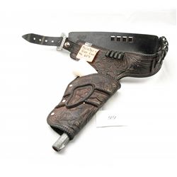 Vintage holster and toy gun from 1960s