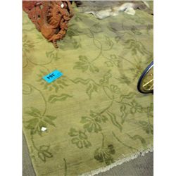 Approx 7F by 11F green fona wool area rug