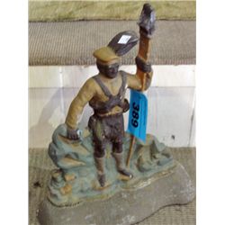 Heavy cast metal golfer door stop