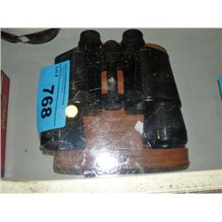 Pair of vintage binoculars with leather case