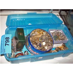 BLue plastic storage bin of assorted costume