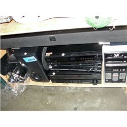 Shelf lot of home electronics; blurays, DVD player