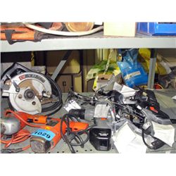 shelf lot of tools and assorted bicycle parts