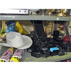 Shelf lot of cordless tool battery chargers, white