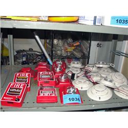 Shelf lot of assorted fire safety equipment