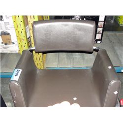 Brown leather salon chair