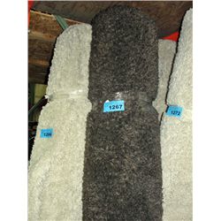 Large charcoal grey shag area rug