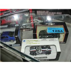 Collection of 4 diecast metal collectors cars