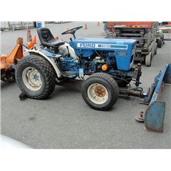 Ford 1100 tractor with push blade and plow